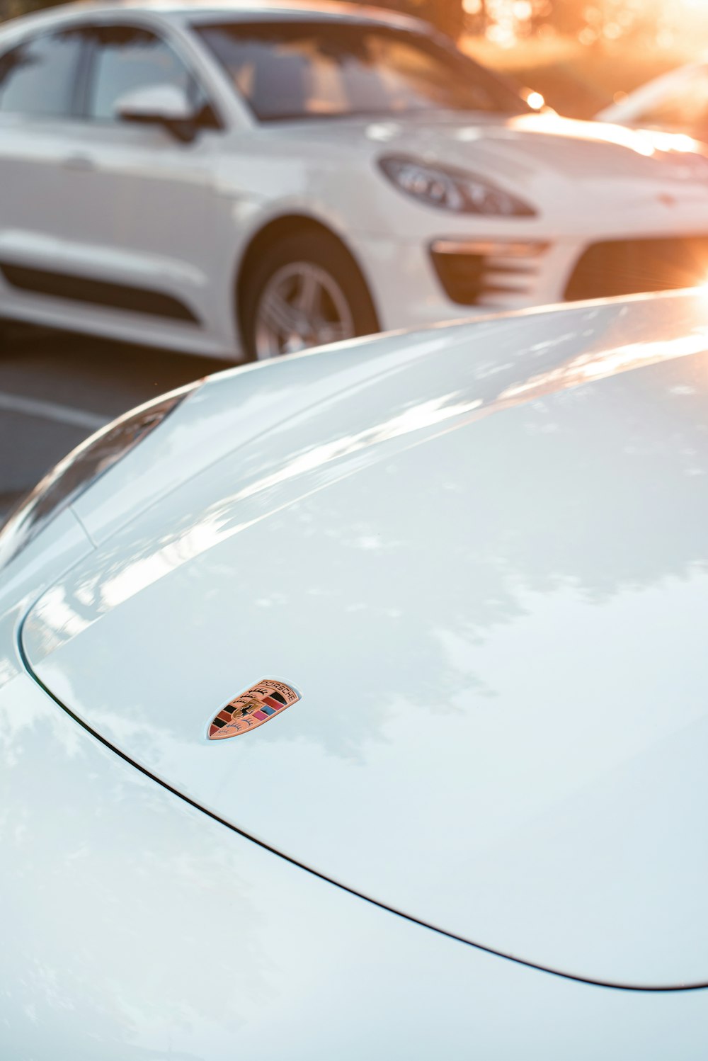 a white car with a logo on it