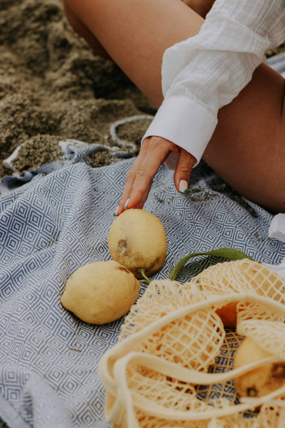 a person holding a couple of potatoes