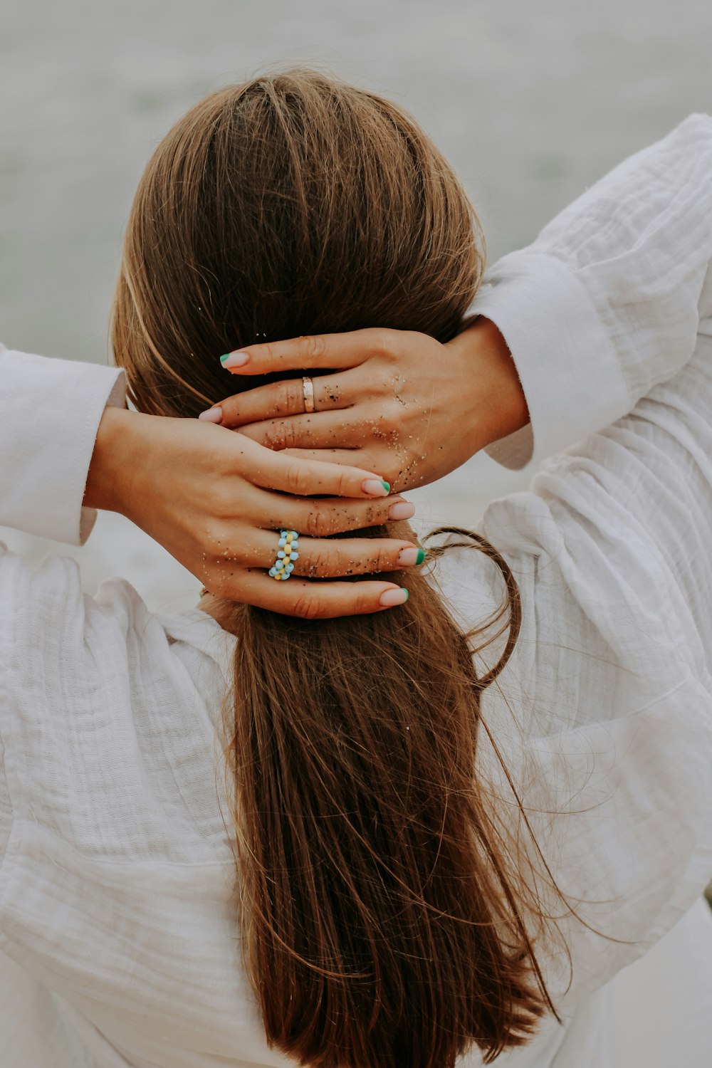 a woman holding her hands together