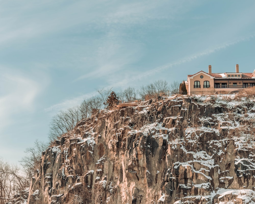 a building on top of a rocky cliff