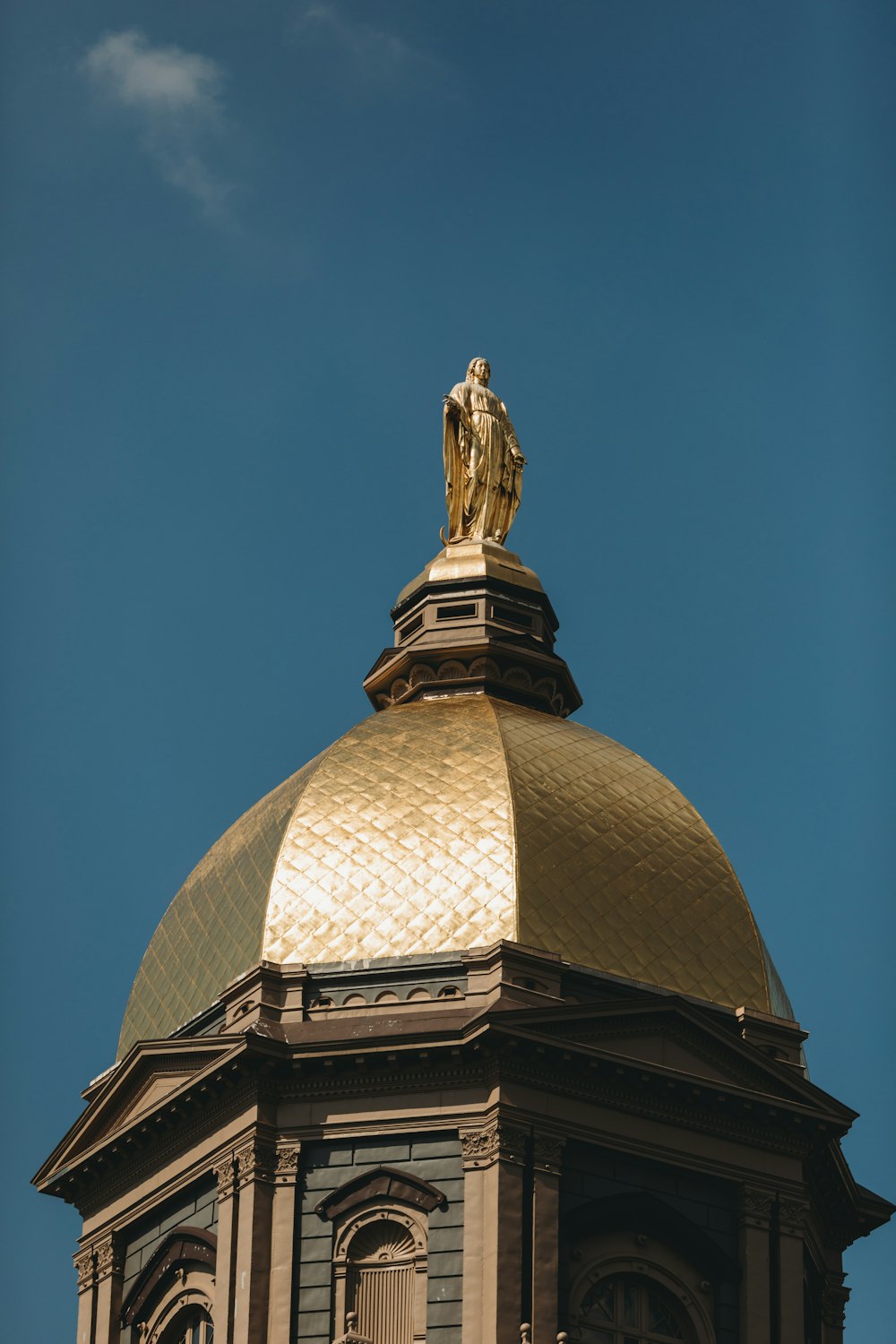 a statue on top of a building