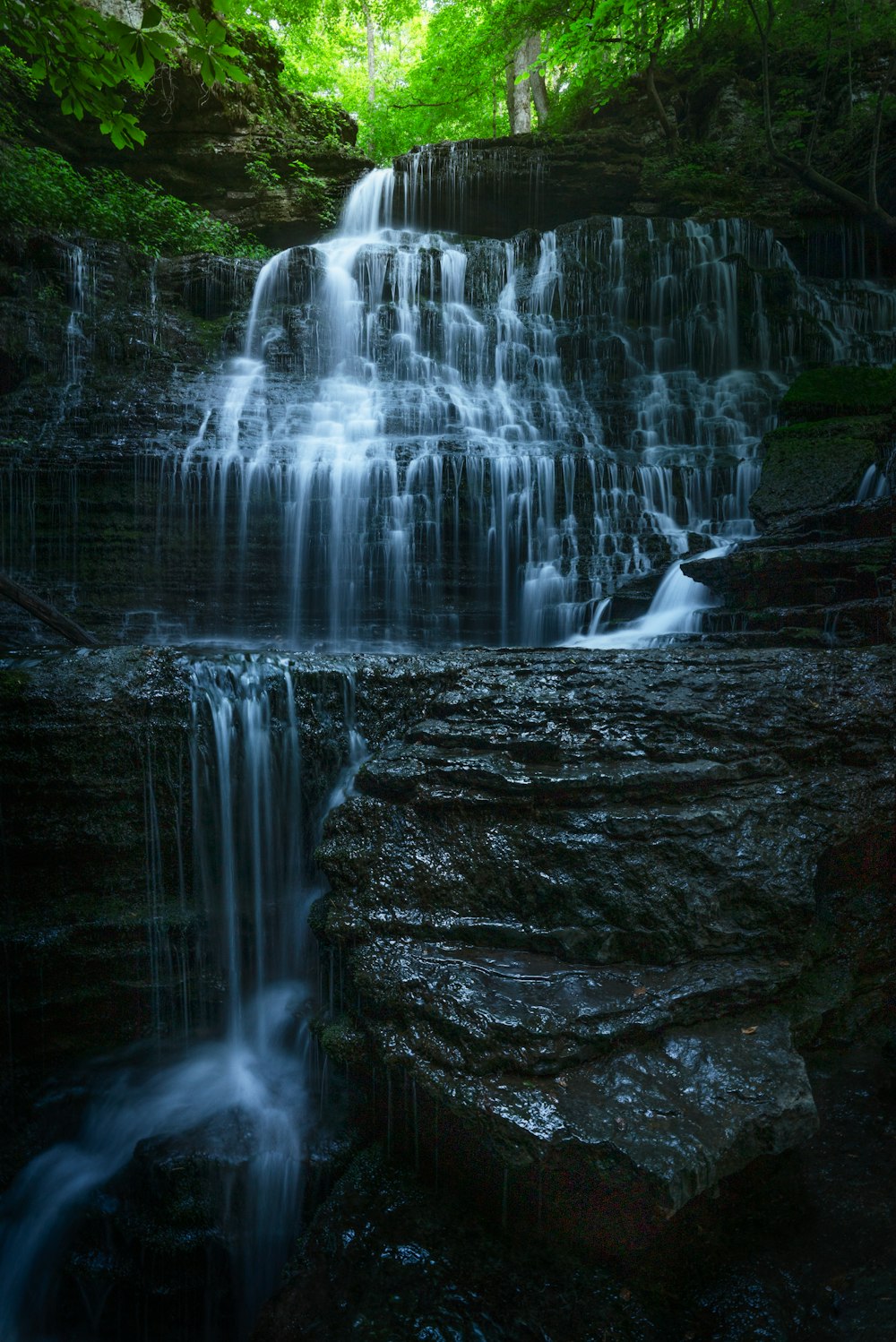 a waterfall in a forest