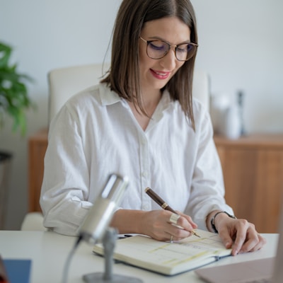 a woman sitting at a table