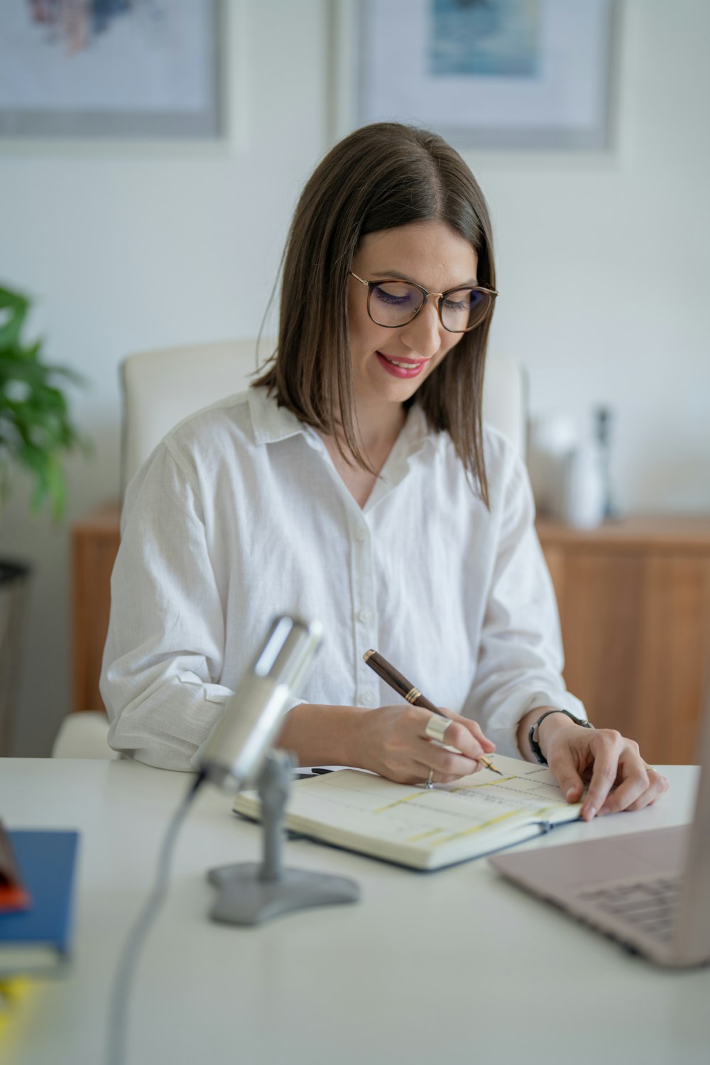 a woman sitting at a table