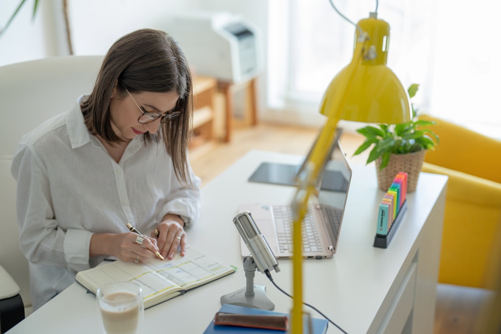 a woman working on a laptop