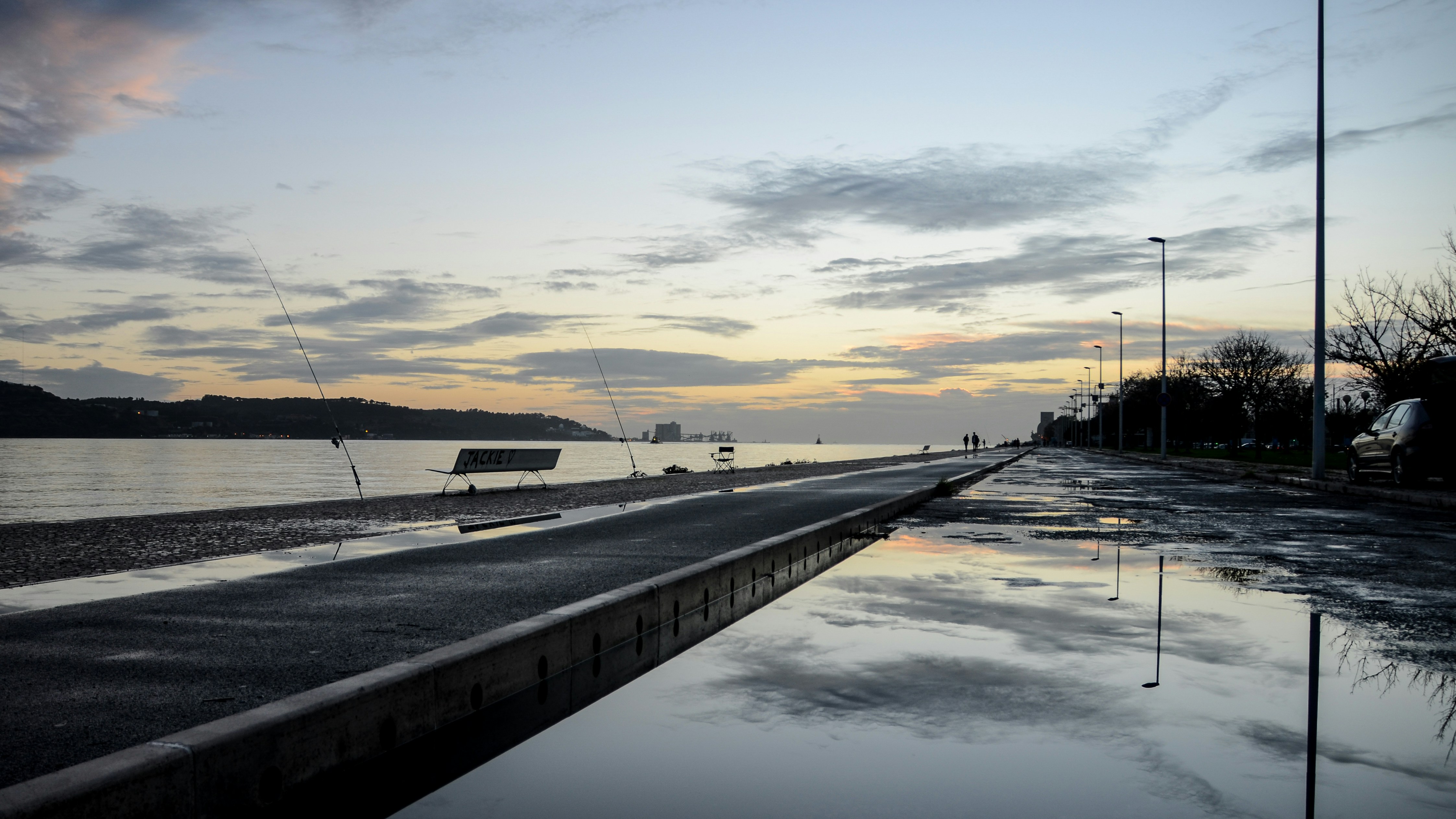 a road with snow on the side