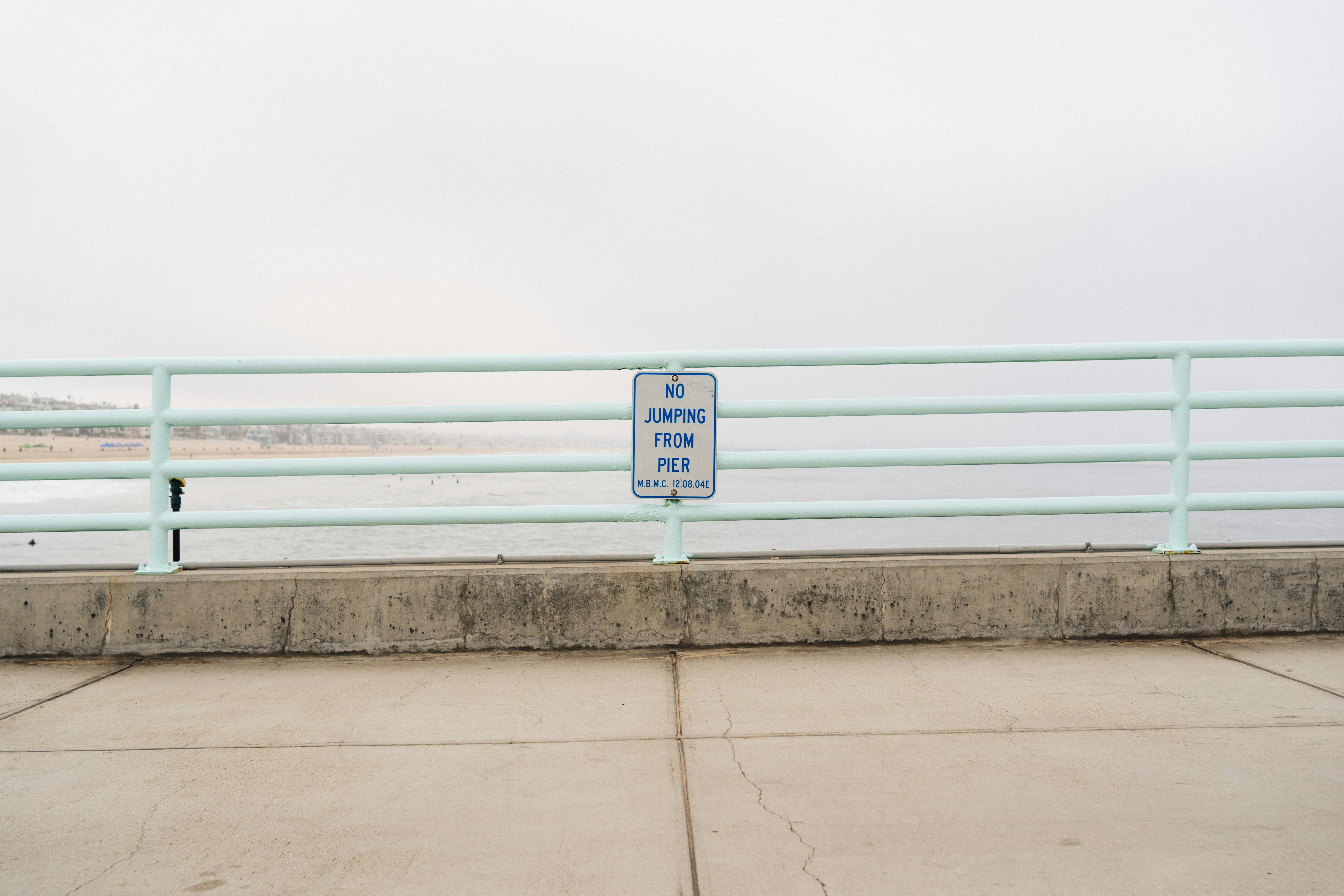 equality rights single sex spaces sign - a sign on a railing