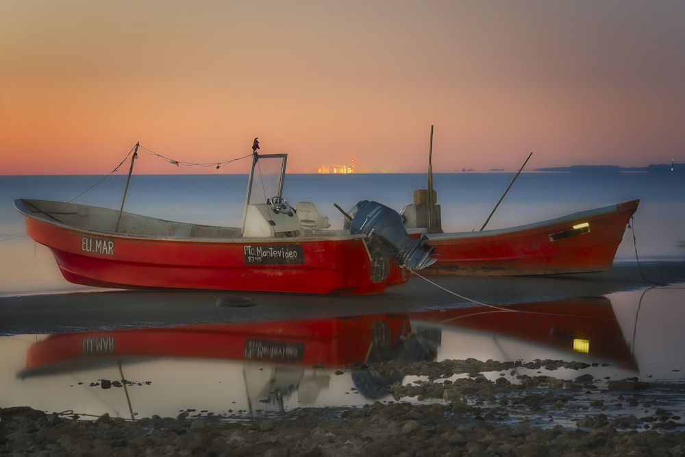 a couple of boats on a beach