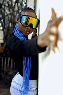 a person wearing a headset and holding the hands up