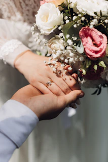a person holding flowers
