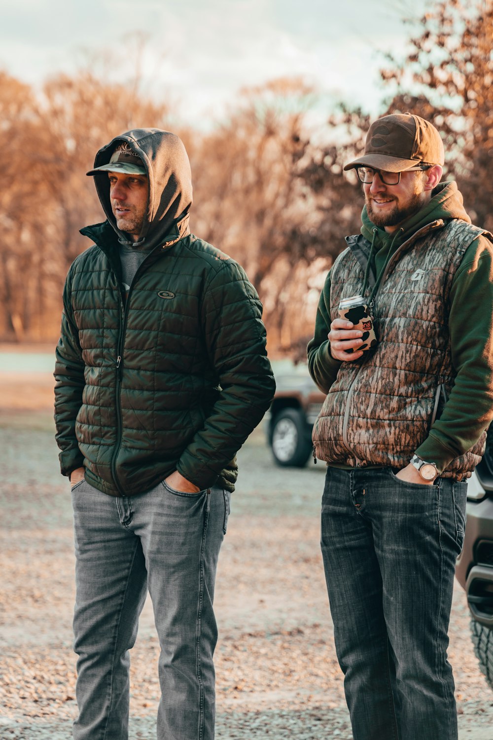 two men standing outside