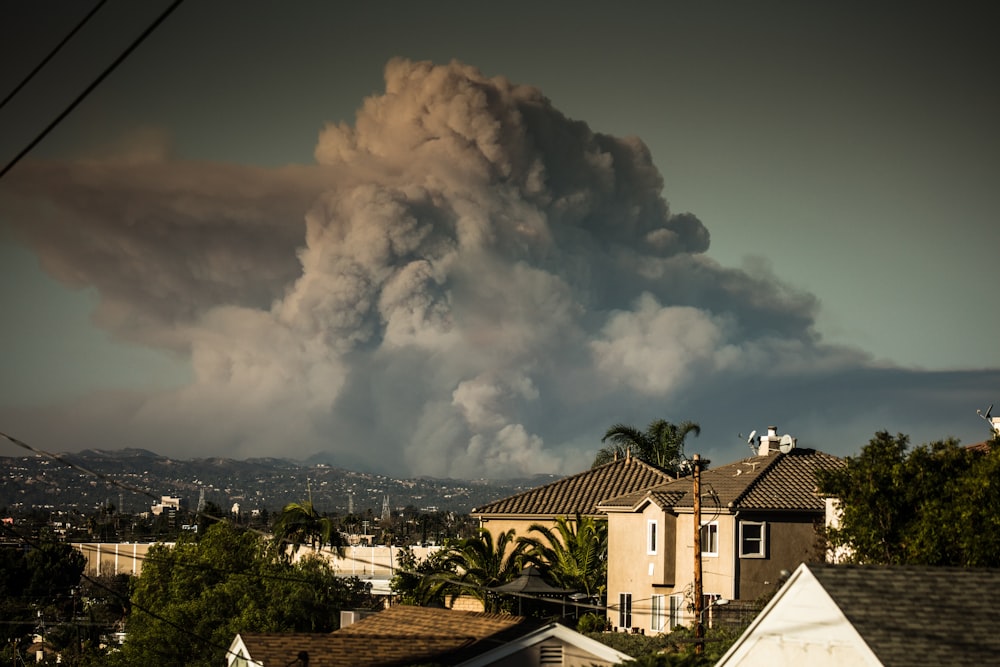 a large storm cloud over a city