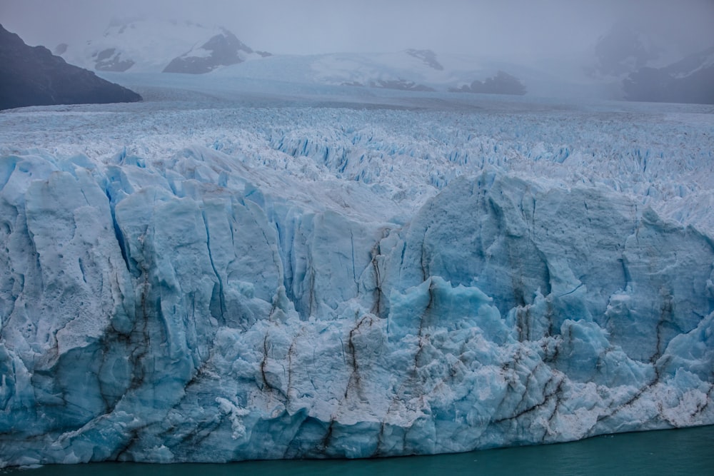 a large glacier in the water