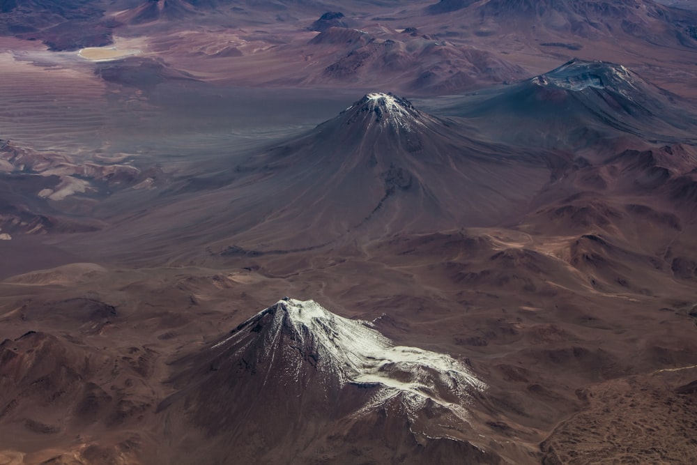 a mountain range with a valley below