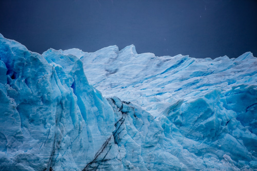 a large glacier with ice