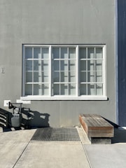 a window with a bench in front of it