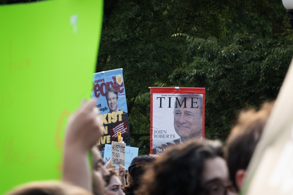 a person holding a sign