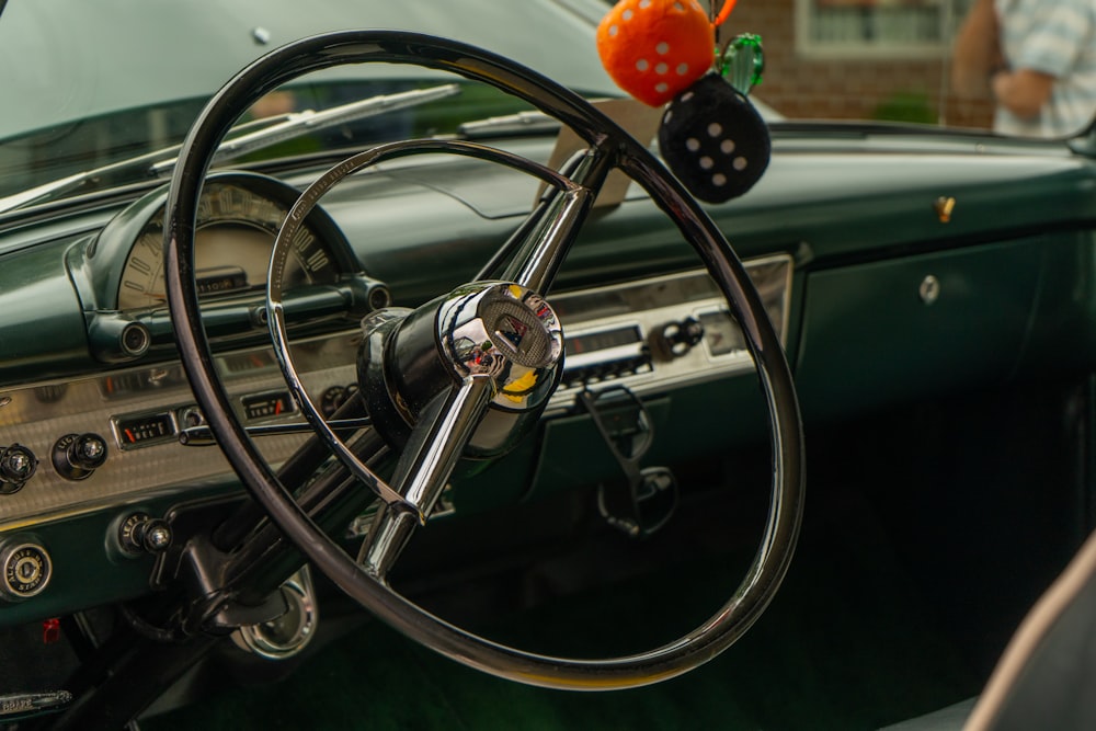 a steering wheel and dashboard of a car