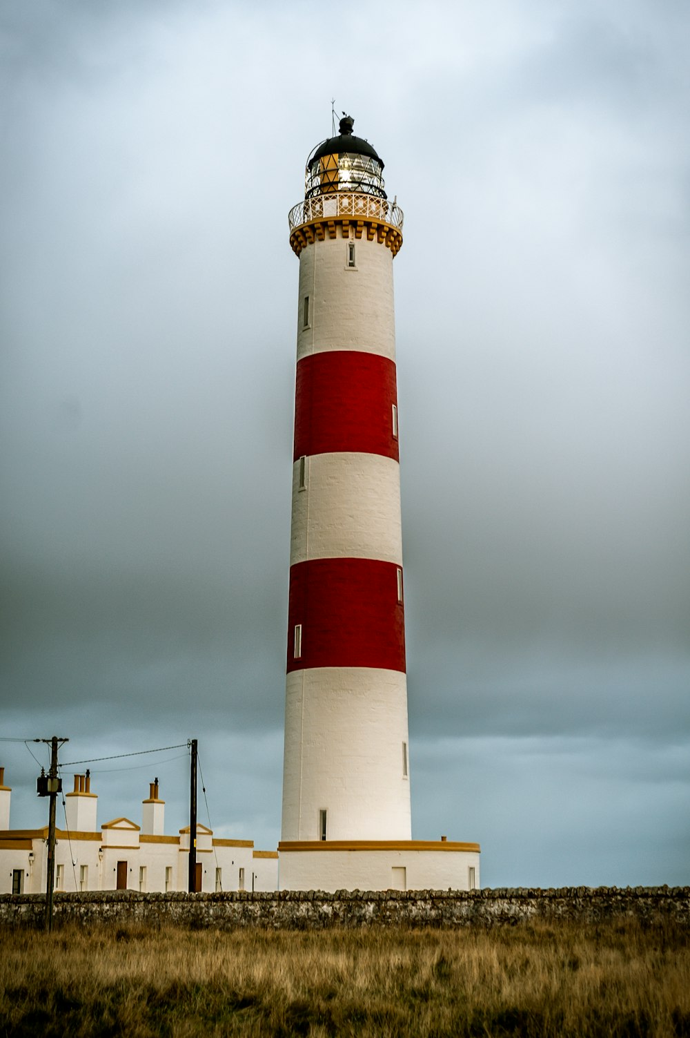 a lighthouse in a field