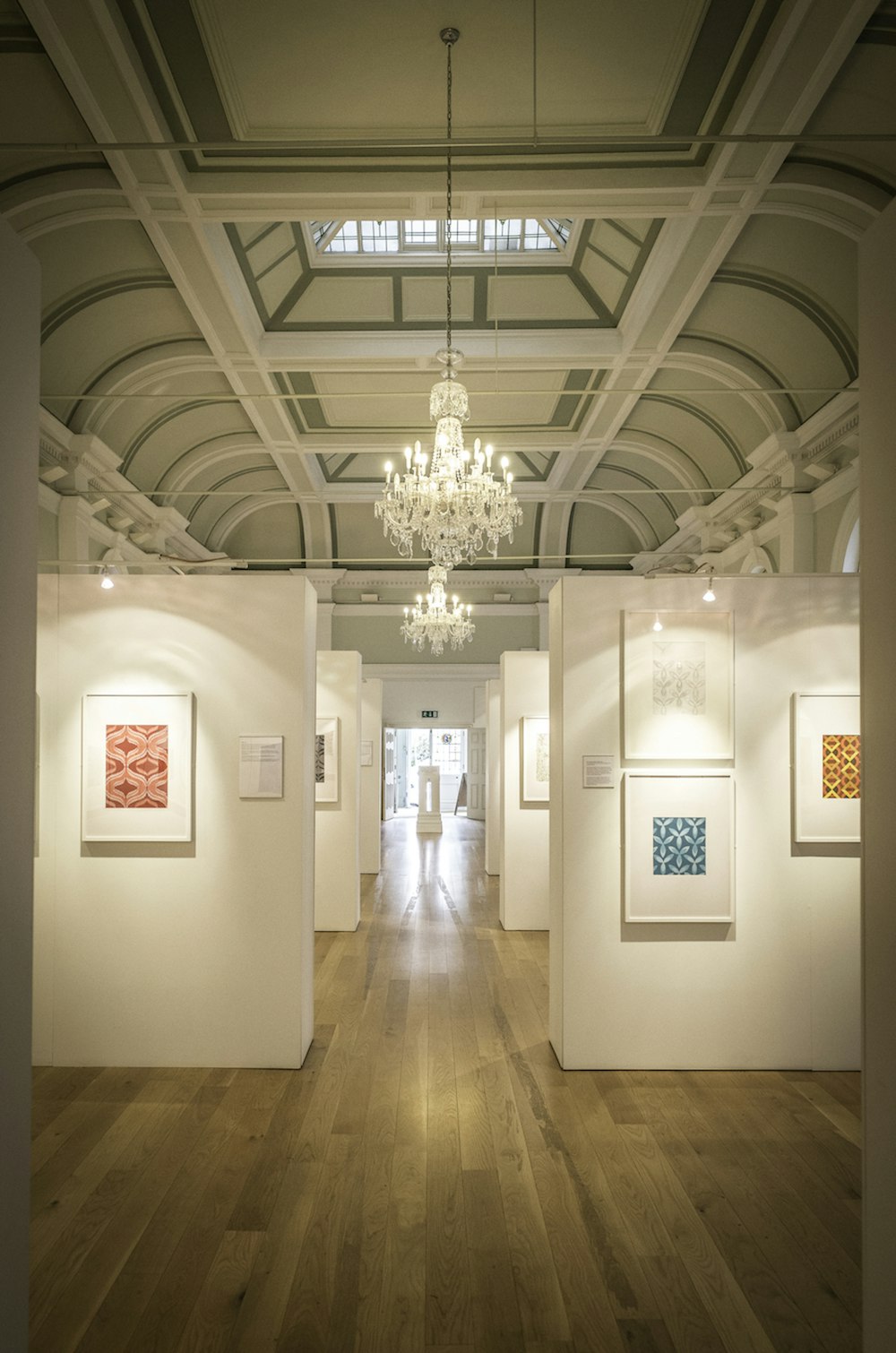 a hallway with a chandelier