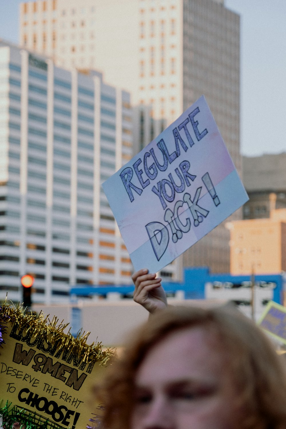 a person holding a sign