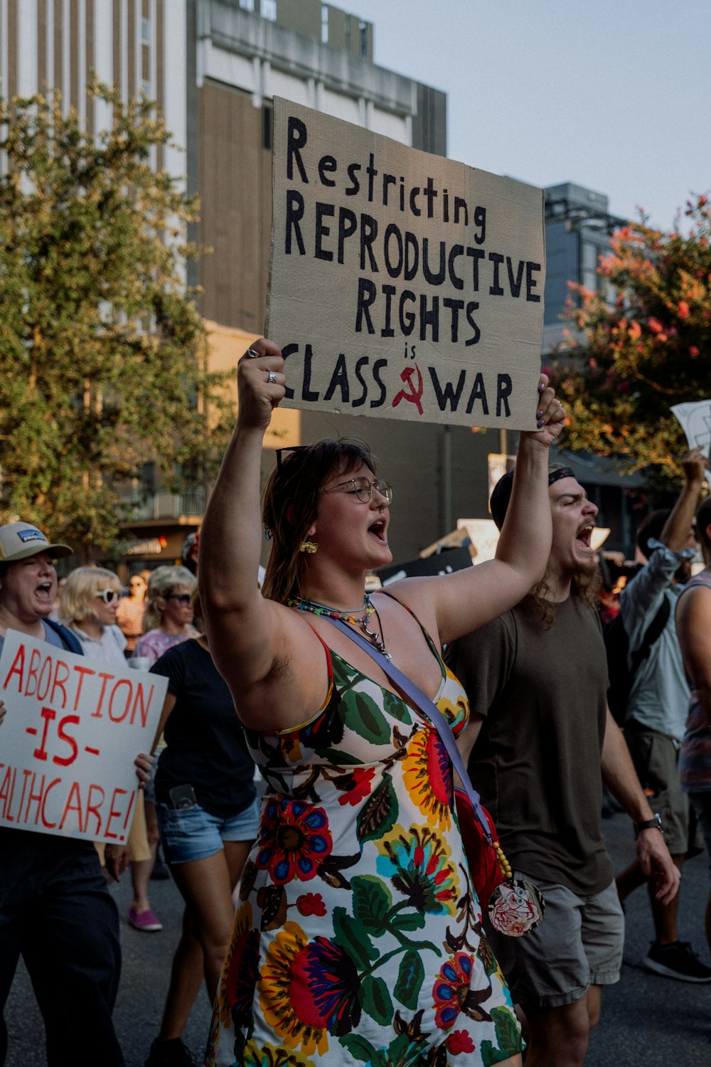 a man holding a sign