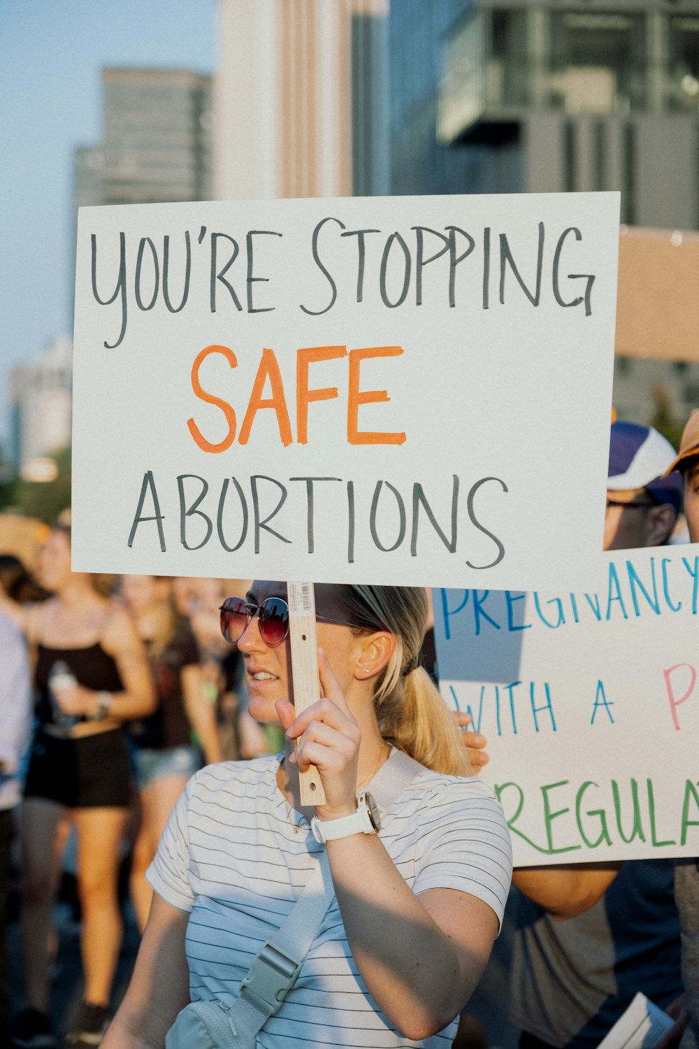 a person holding a sign