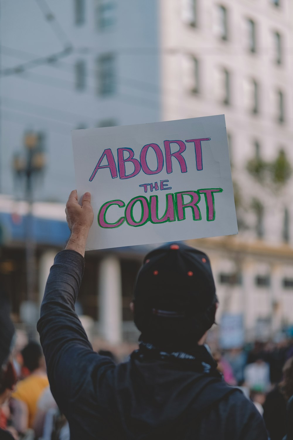 a person holding a sign