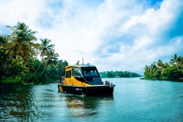 a yellow boat on the water
