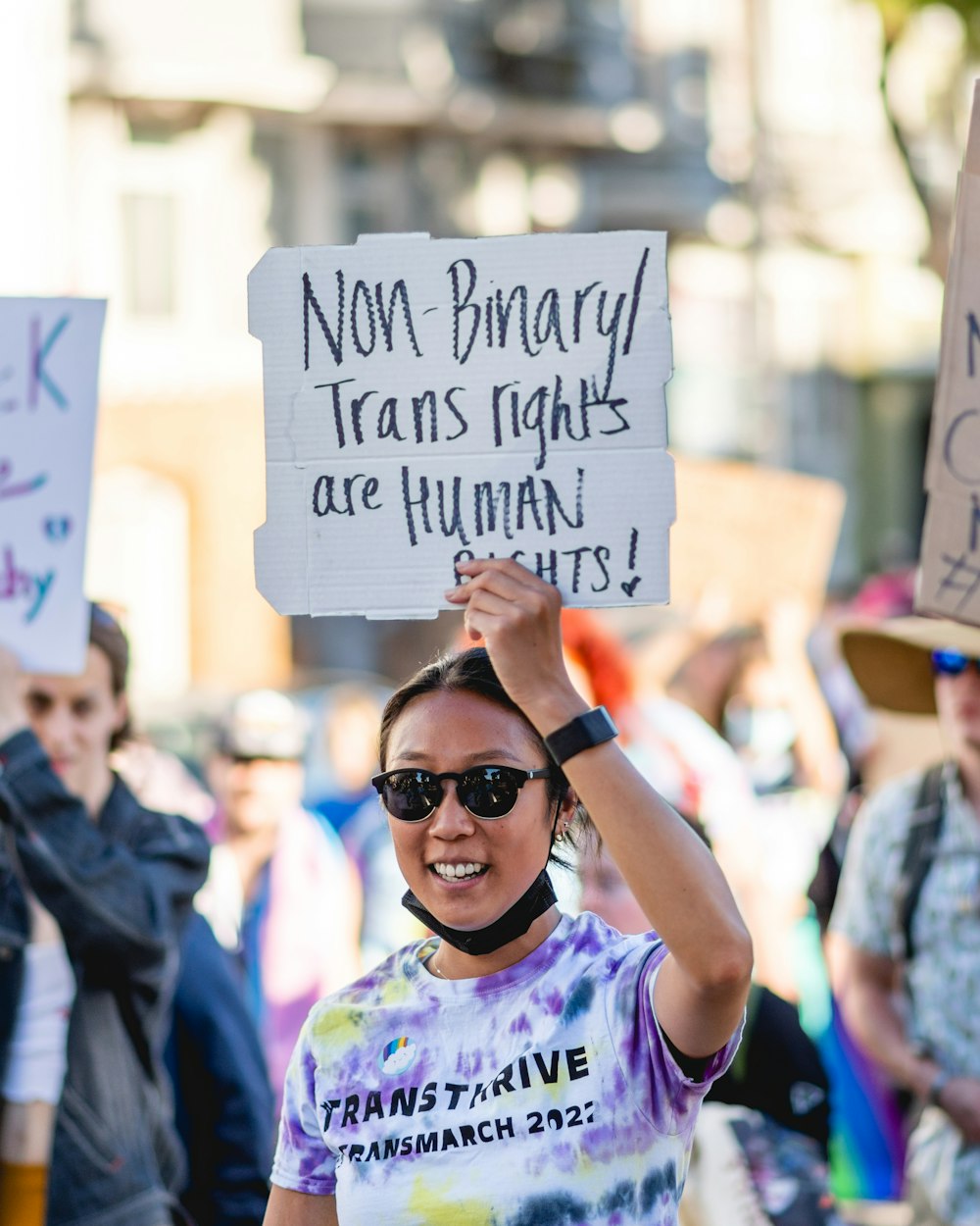 a person holding a sign