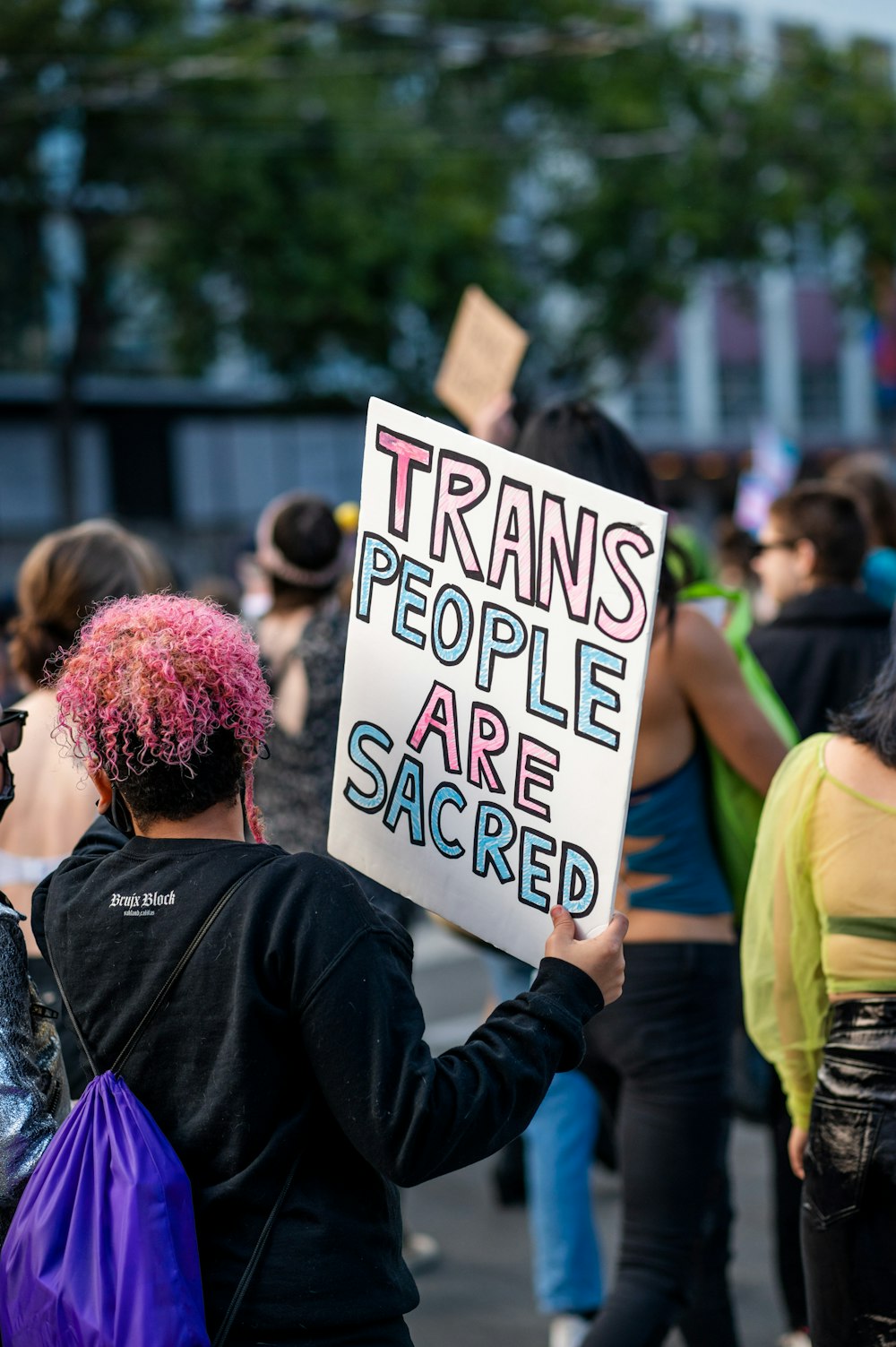 a person holding a sign