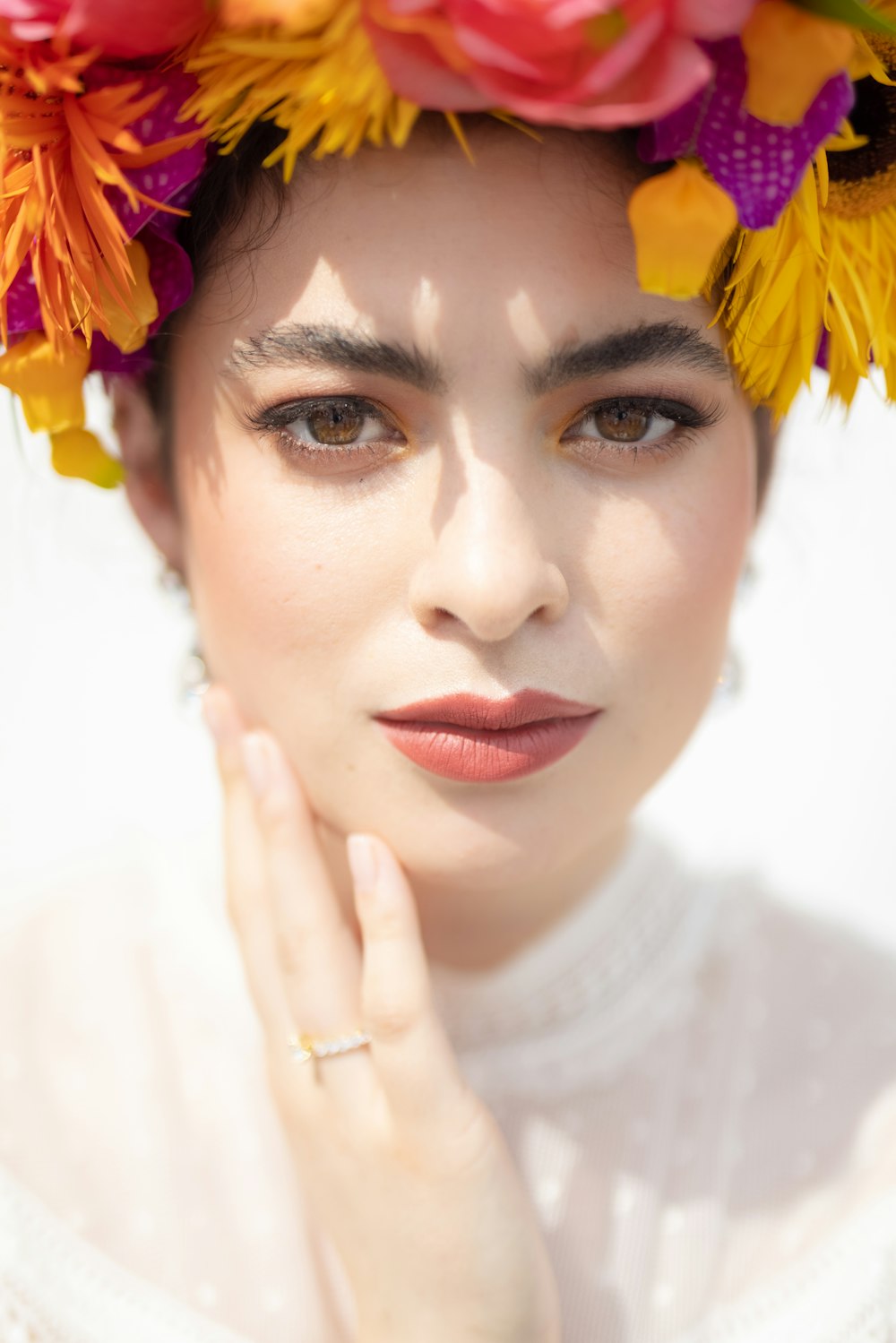 a woman with flowers on her head