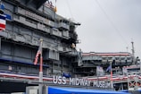 a large ship with flags on it