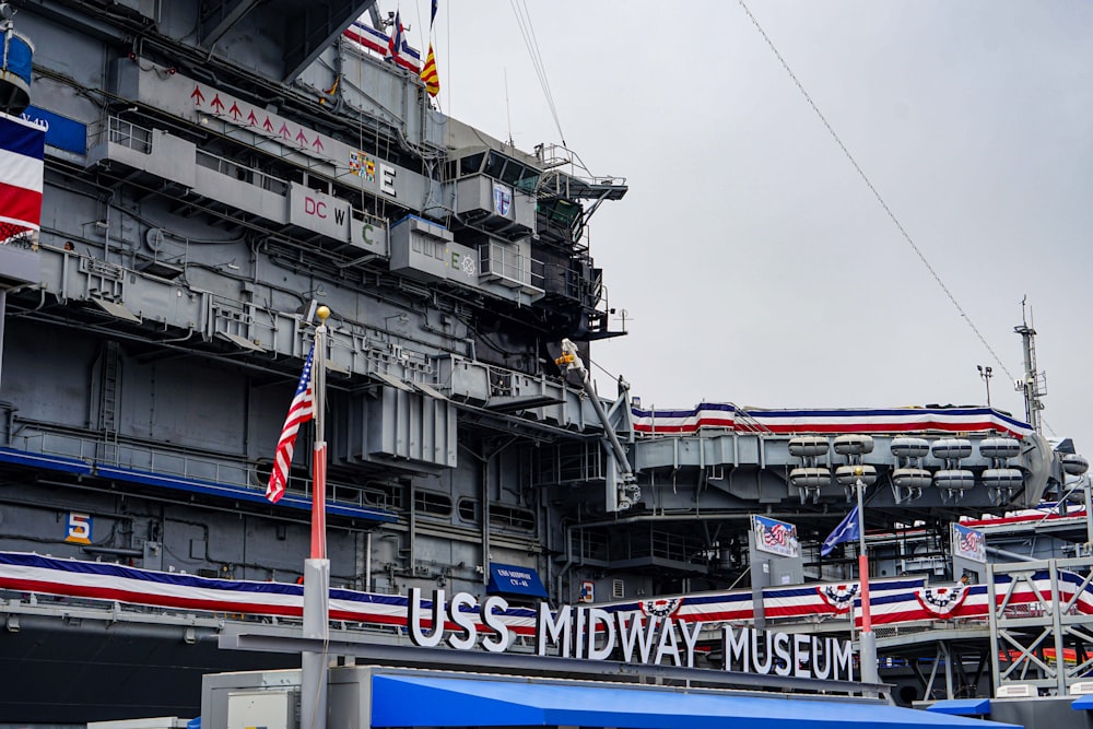 a large ship with flags on it