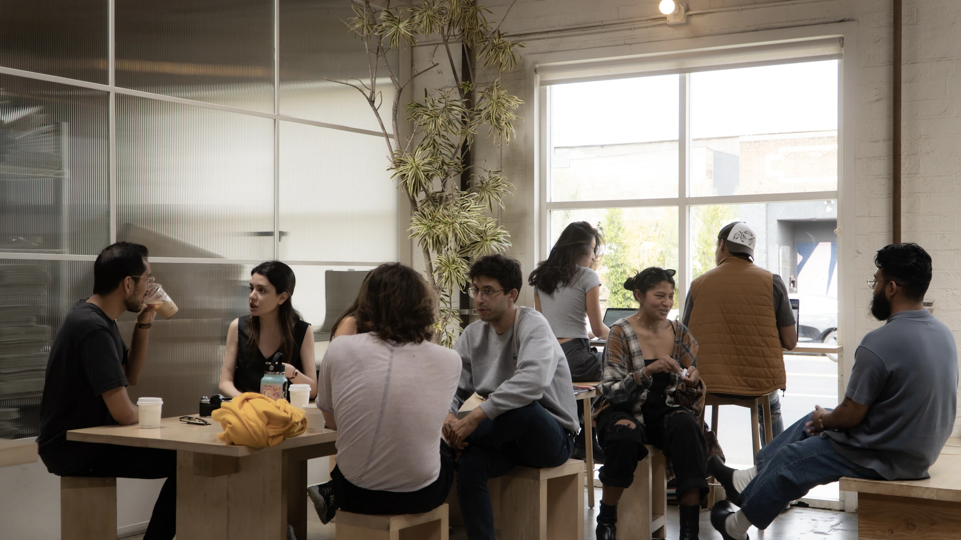 a group of people sitting around a table