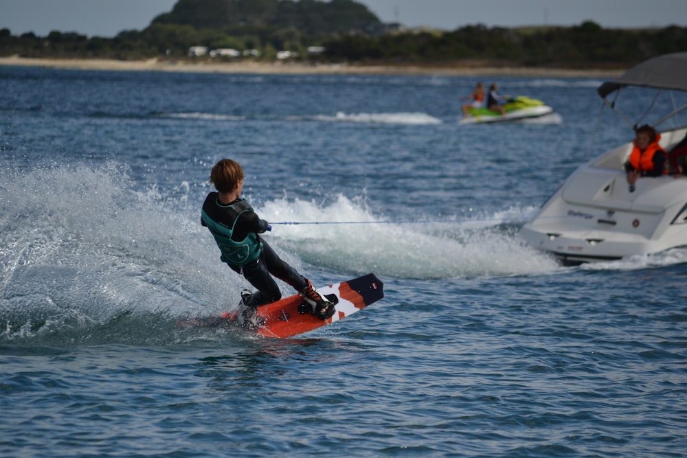 a kid riding a surfboard