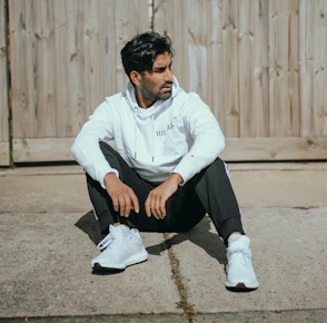 a man sitting on the ground