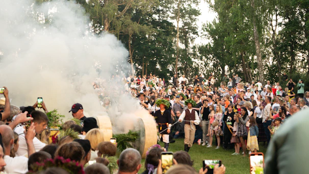 a group of people watching a band on stage