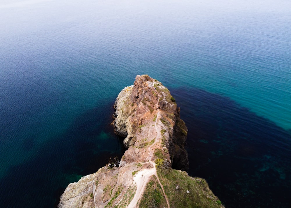 a rocky cliff overlooking the ocean