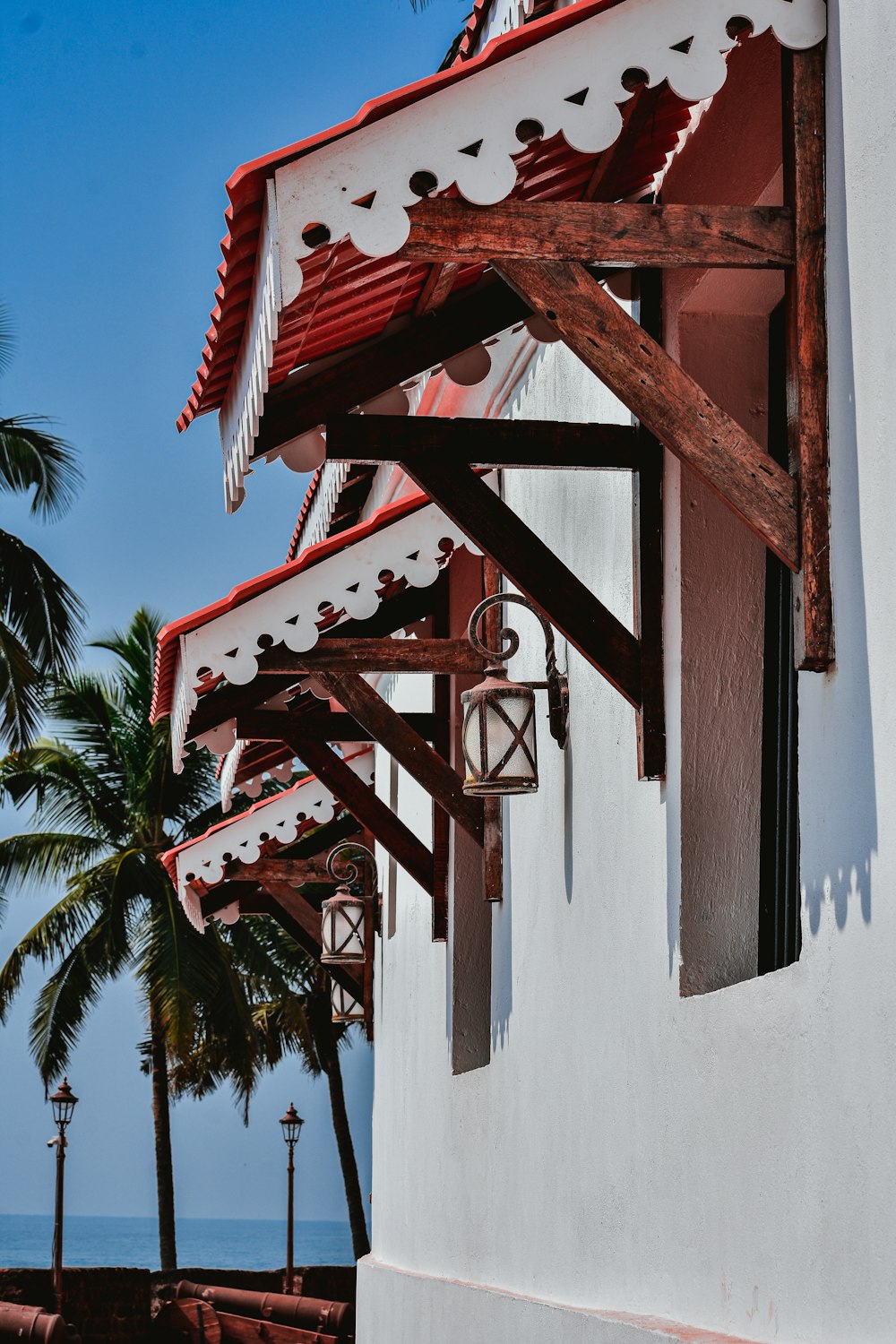 a red and white boat on a building