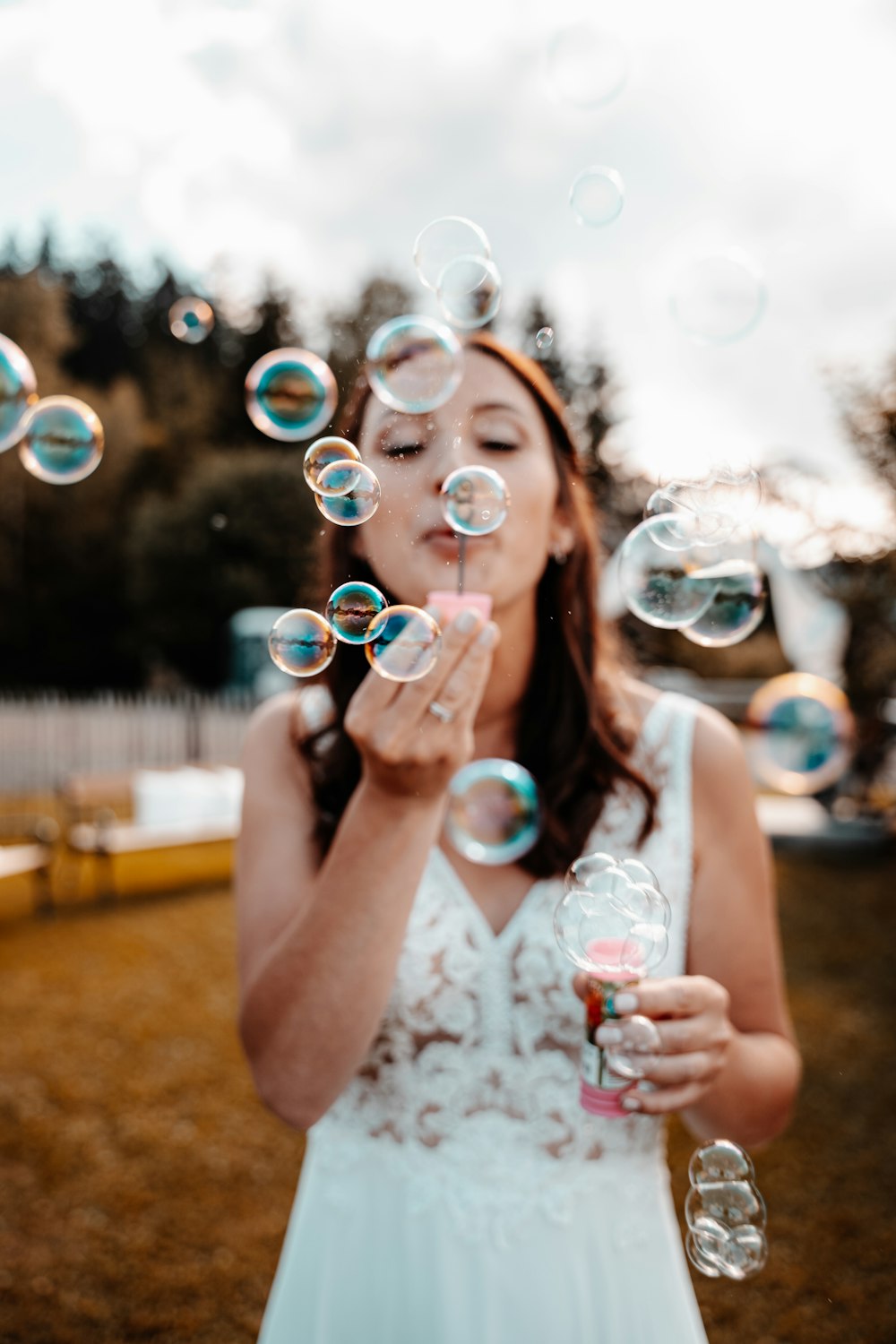 a person holding bubbles
