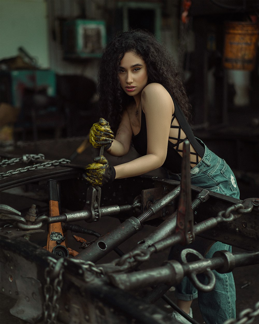 a woman sitting on a tank