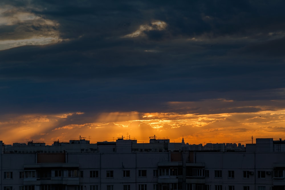 a sunset over a city