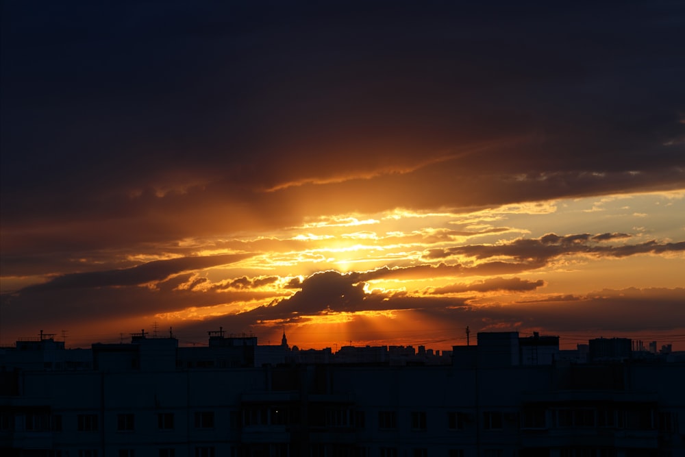 a sunset over a city