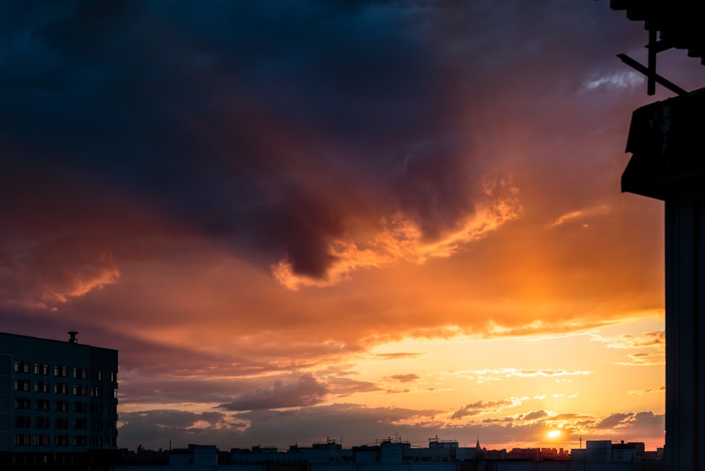 a sunset over a city