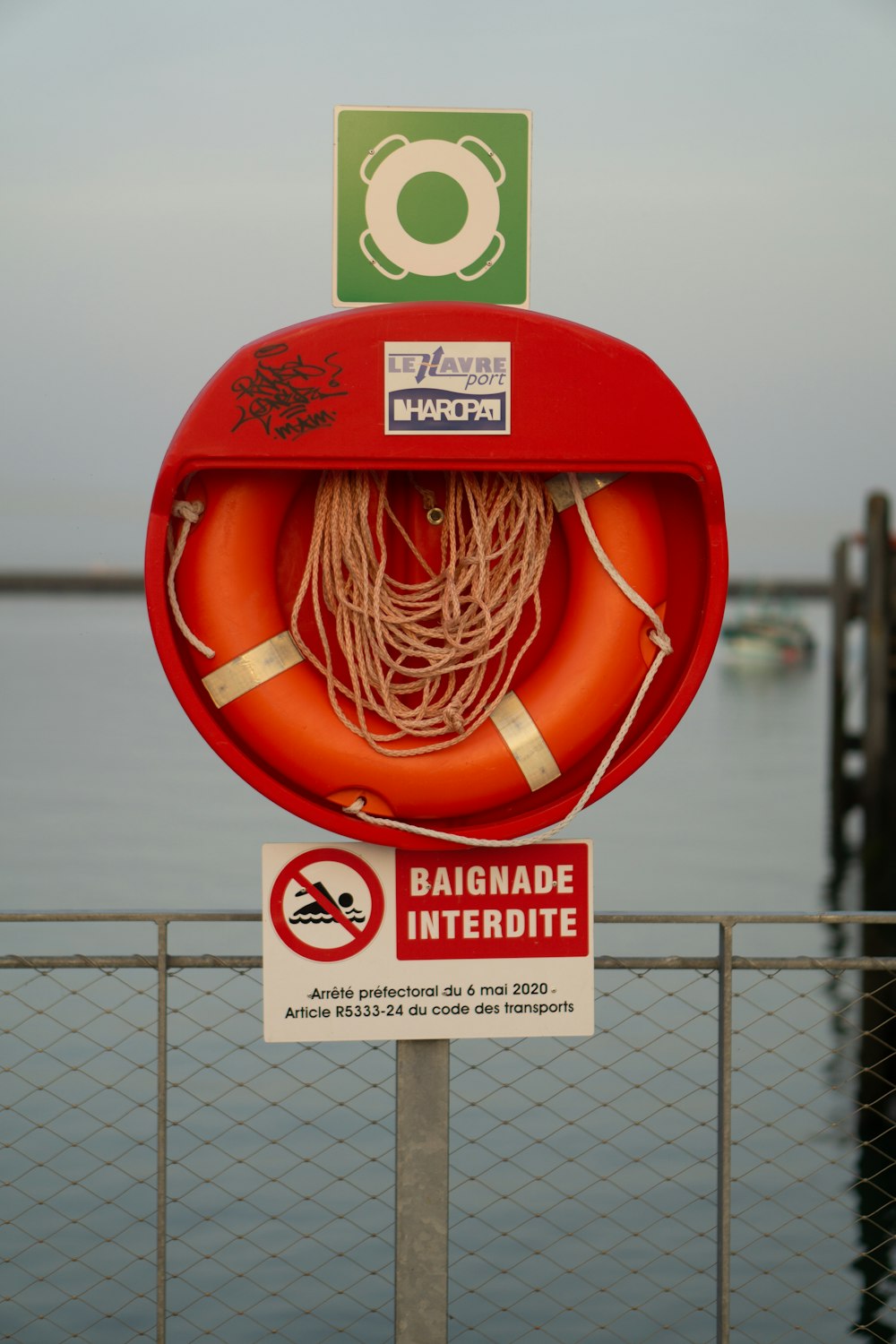 a basketball hoop with a sign