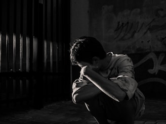 a person sitting on the ground