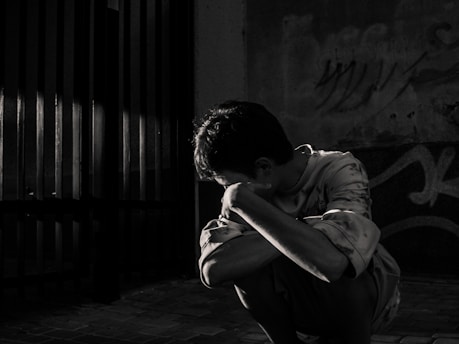 a person sitting on the ground