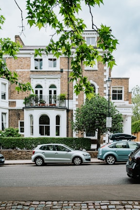 cars parked in front of a building