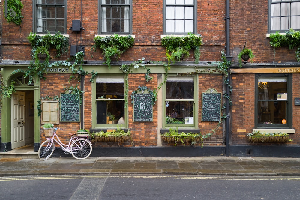 a bicycle parked in front of a building